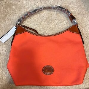 NEVER USED Orange Dooney & Bourke purse.